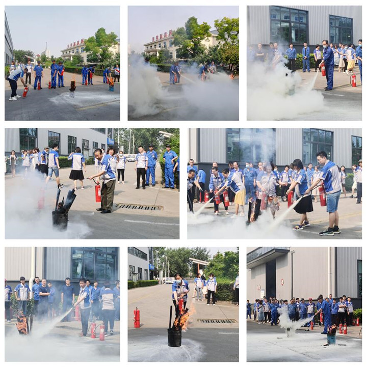 公司员工轮番上场，亲身体验了灭火器的正确使用方法